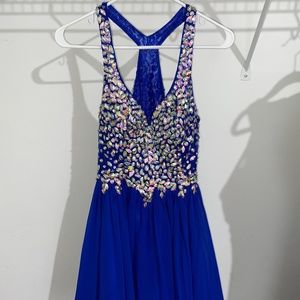 Blue sequined mini length dress with high back
